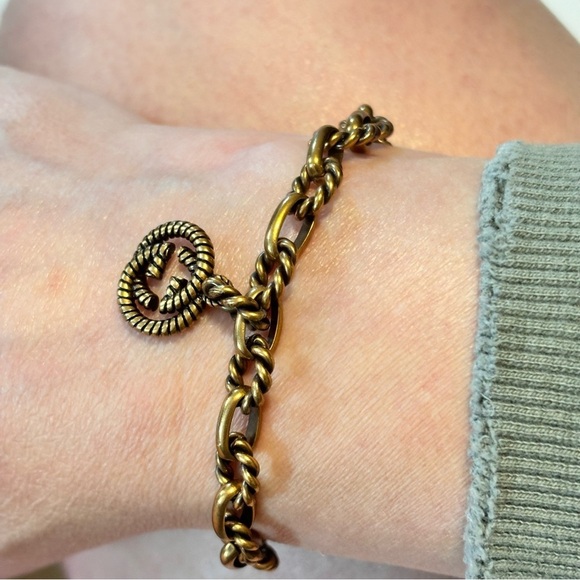 Fancy Link Chain
Antique Gold Finish
Bracelet With Double G
Motif 7” - Picture 6 of 11